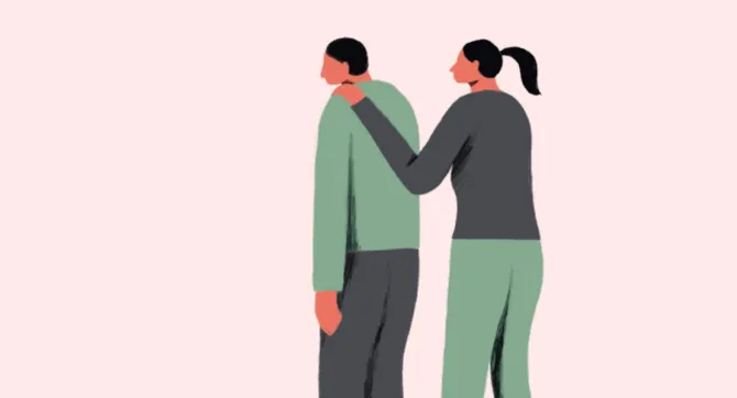 vrouw legt hand op schouder van een man