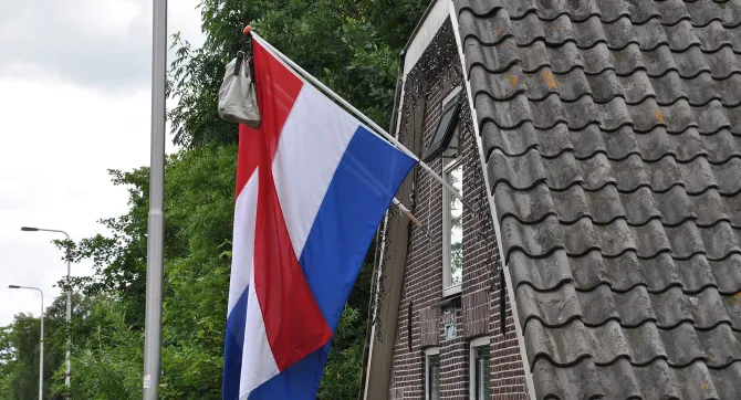 Geslaagde vlag met tas