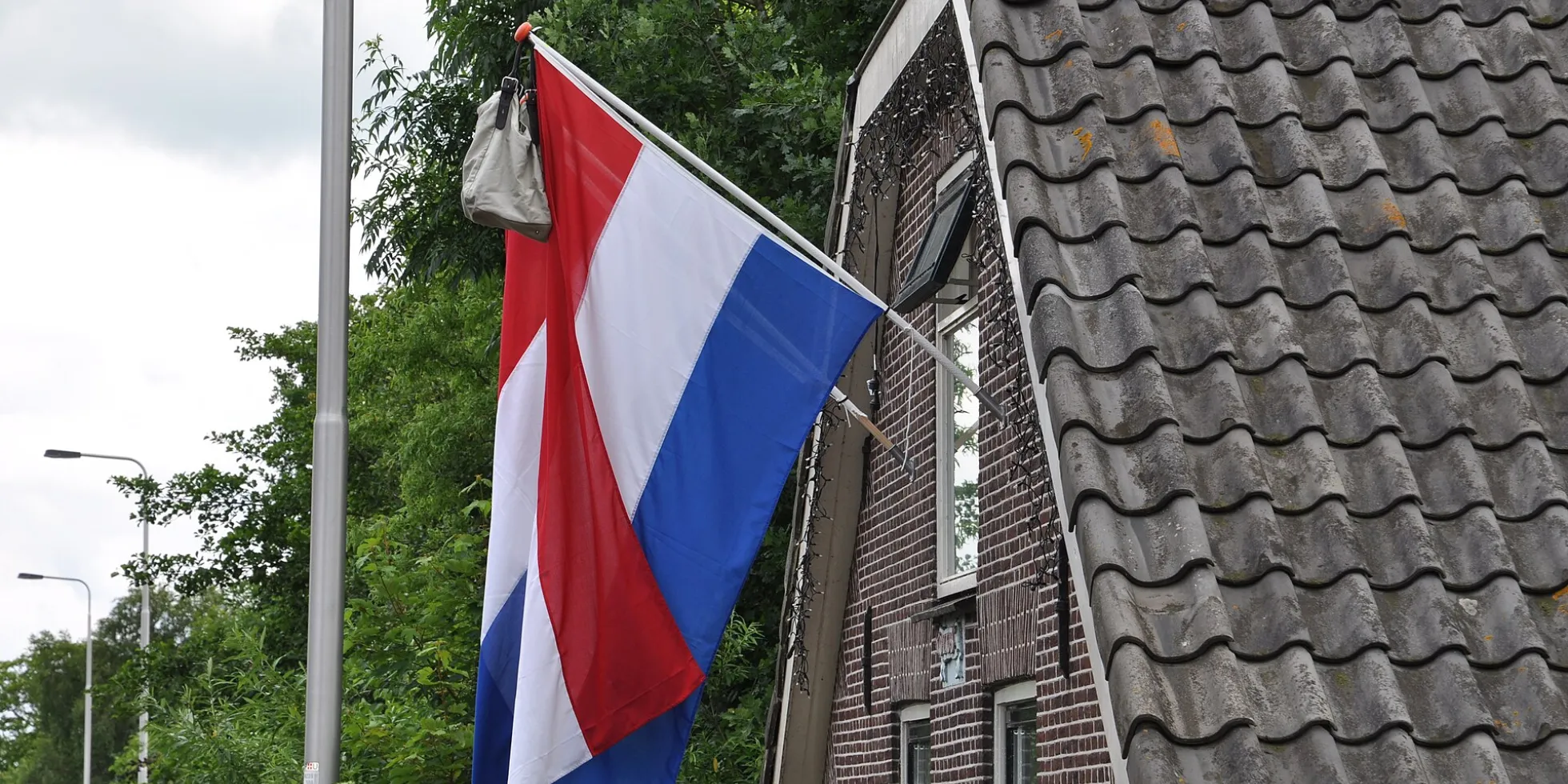 Geslaagde vlag met tas
